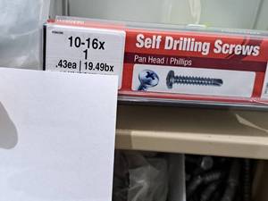 lot 1185 image: Lot of (200) Hillman Self Drilling Screws 10-16x12  Pan Head  Phillips Drive #H560290