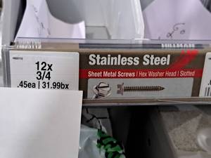 lot 1196 image: Lot of (200) Hillman Stainless Steel Sheet Metal Screws 12x34  Hex Washer Head  Slotted Drive #H823112