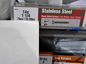 lot 1202 image: Lot of (100) Hillman Stainless Steel Sheet Metal Screws 14x1-14  Hex Washer Head  Slotted Drive #H823140