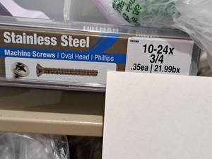 lot 1231 image: Lot of (100) Hillman Stainless Steel Machine Screws 10-24x34  Oval Head  Phillips Drive #H825904