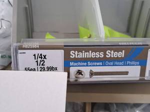 lot 1378 image: Lot of (200) Hillman Stainless Steel Machine Screws 14x12  Oval Head  Phillips Drive #H825984