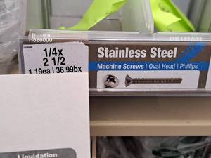 lot 1385 image: Lot of (134) Hillman Stainless Steel Machine Screws 14x2-12  Oval Head  Phillips Drive #H826000