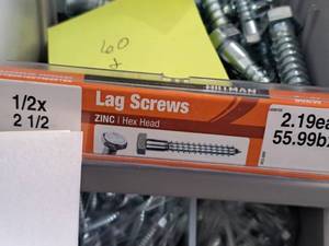 lot 1511 image: Lot of (60) Hillman Zinc Lag Screws 12x2-12  Hex Head #H230122