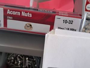 lot 1520 image: Lot of (250) Hillman 10-32 Zinc Acorn Nuts #H180084