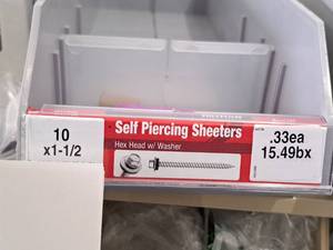 lot 1674 image: Lot of (297) Hillman Self Piercing Sheeters 10x2-12  Hex Head w Washer #H47736