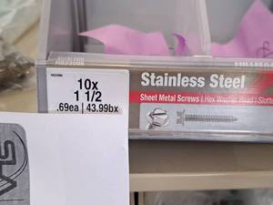 lot 1823 image: Lot of (217) Hillman Stainless Steel Sheet Metal Screws 10x1-12  Hex Washer Head  Slotted Drive #H823096