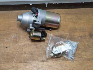lot 59 image: Electric Starter Motor with Relay - NSTP 790224 - Charge Coil - Bolts - Clamper Cord