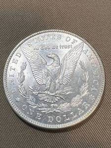lot 26 image: 1886 US MORGAN SILVER DOLLAR UNC