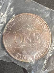 lot 28 image: 1 TROY OZ .999 FINE SILVER SUNSHINE MINT ROUND