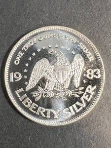 lot 46 image: 1 TROY OZ .999 FINE SILVER LIBERTY AMARK ROUND
