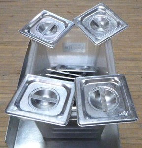 lot 34 image: 16 Stainless Lids