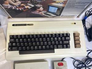 lot 38 image: Vintage Commodore VIC-20 Computer with VIC-1515 Graphic Printer, 1541 Floppy Disk Drive and More