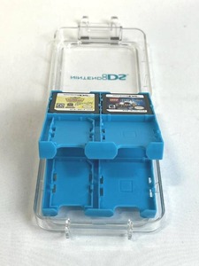 lot 109 image: Nintendo DS 16 Slot Tray with 2 Games - Harry PotterSesame Street Elmos Musical Masterpiece
