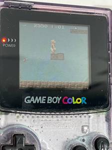 lot 110 image: Two Nintendo Game Boy Color with 3 Games - Super Mario Bros DeluxeTony Hawks Pro SkaterHoyle Card Games