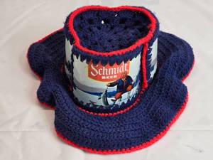 lot 59 image: Hat Crocheted Around 3 Schmidt Beer Cans