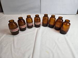 lot 70 image: Lot of 8 Schmidt Pony Bottles