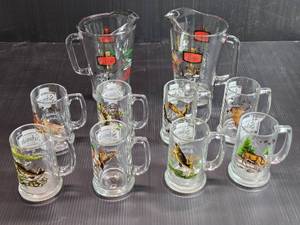 lot 99 image: Lot of 2 Pitchers and 8 Mugs Schmidt Beer Wildlife Collector Series