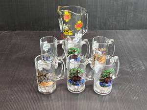 lot 101 image: 1 Pitcher & 6 Mugs Schmidt Beer Collector Series 2 - Some Duplicate Mugs