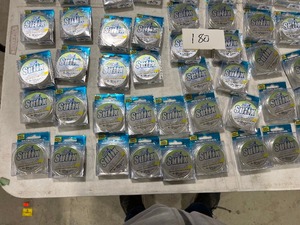 TABLE FULL OF FISH GEAR & LINE