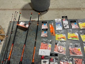 TABLE FULL OF FISHING LEADERS, RODS, & RIGS