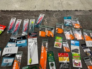 TABLE FULL OF LEADERS, SWIVELS, JIGS, LURES, & BOBBERS