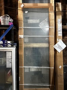 lot 275 image: Glass and Wood Exterior Door Unfinished Ready to Paint 8 x 3