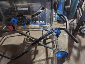 lot 21 image: Delta 10 Portable Table Saw on Gravity Stand
