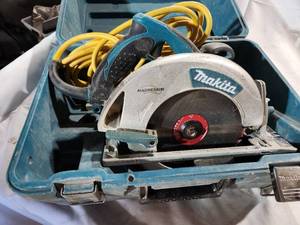 lot 143 image: Makita Model 5007MG 7 14 Circular Saw