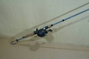 lot 8 image: NEW Ozark Trail Baitcast Rod and Reel Combo