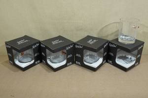 lot 50 image: 4 Lucky Shot Rocks Glasses with Embedded Bullets