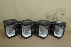 lot 51 image: 4 Lucky Shot Pint Glasses with Embedded Bullets