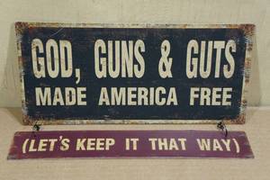 lot 54 image: Metal Sign God, Guns, and Guts Made America Free