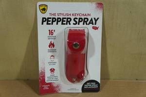 lot 108 image: Guard Dog Pepper Spray Keychain