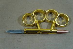 lot 165 image: Brass PaperweightKnifeBelt Buckle