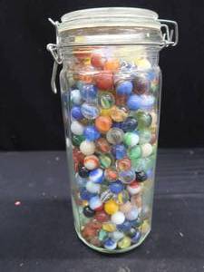 TALL JAR OF VINTAGE MARBLES