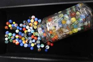 COLLECTIBLE MARBLES IN PLANTERS PEANUTS GLASS JAR