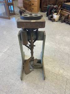 lot 2 image: Antique Boat Motor on Stand