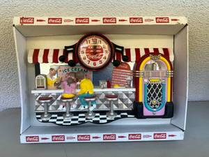 lot 106 image: Coke Artwork Clock