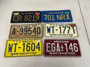 lot 255 image: CA & AZ License Plates