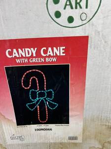 lot 301 image: 5 Light Up Candy Cane with Green Bows