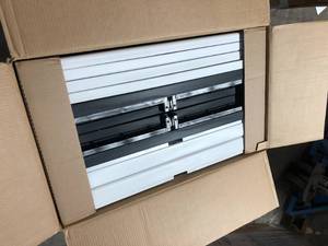 HDX Plastic Freestanding Garage Cabinet in Gray (35 in. W x 71 in. H x 18 in. D) Customer Returns See Pictures
