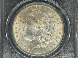 1883-O  Morgan Silver Dollar PCGS MS 63 PCGS Price Guide is $90