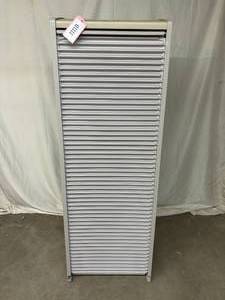 lot 57 image: MSRP $3000 Herman Miller Milcare Storage Cabinet With Roll Up Door Front Comes With 6 Drawers & A Couple Shelves - Great Condition 1st Pic Shows Inside & Out Of Cabinet&nbsp66 x 23 x 18 