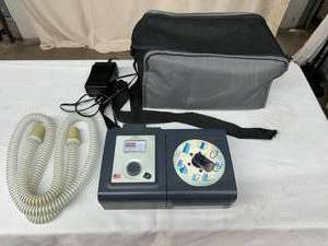 lot 78 image: MSRP $2500 Philips Respironics System One REMstar Auto With A-Flex CPAP Machine With Heated Humidifier, Reservoir, Tube Hose, Data Card, Travel Bag, and Power Cord - Good Working Condition No Mask 1st Pic Is Stock Photo 