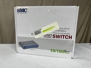 lot 26 image: NEW In Box SMC Network SMCFS8 8-Ports 10100Mbps Fast Ethernet EZ Switch and APC BE350G Back-UPS 350 Surge Protection - Works