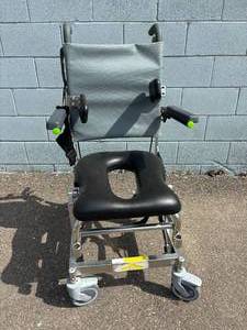 lot 6 image: WOW MSRP $3300 Height Adjustable Rehab Shower Tilt In Space Back Up Over The Toilet Seat Commode Chair -Flip Up Locking Arms, Locking Oversize Wheels, Adjustable Tension Back & Padded Seat - Approx 17 Seat Width - Great Condition