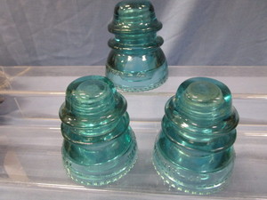 lot 83 image: Blue Glass Insulators