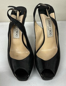 lot 20A image: Sleek Black Jimmy Choo High Heeled Shoes