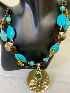 lot 136 image: Stunning Turquoise Colored and Gold-Tone Necklace