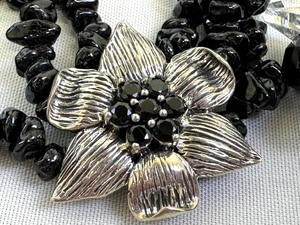 lot 114A image: Triple Strand Black Beaded Sterling Floral Pendant Necklace and a Dazzling Black Beaded Necklace